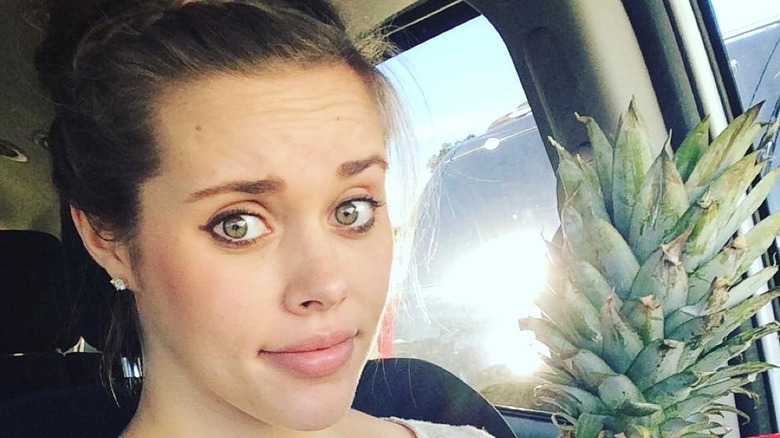 Jessa Duggar holding a pineapple