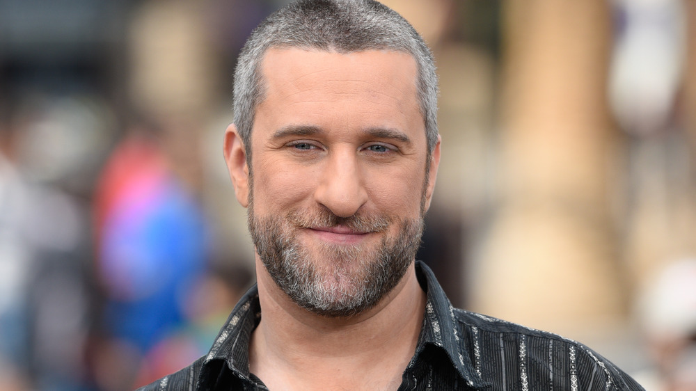 Dustin Diamond smiling at outdoor event