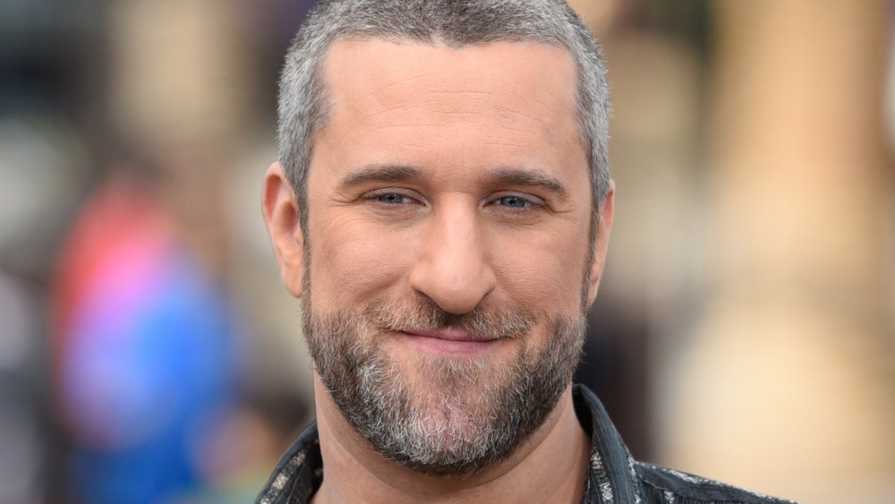 Dustin Diamond posing on red carpet