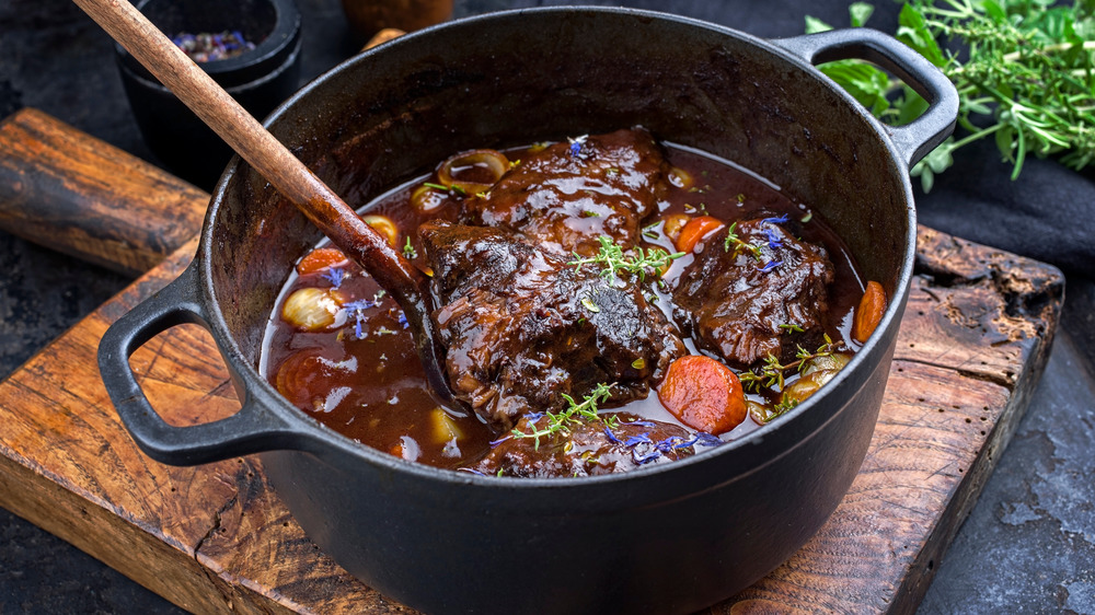 A Dutch oven with stew inside