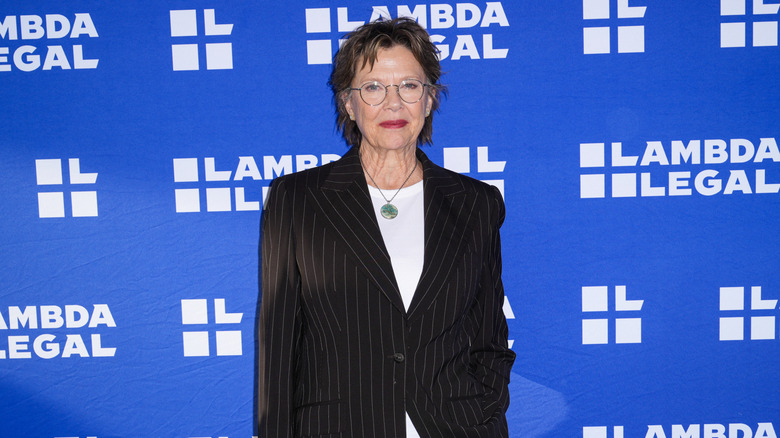 Annette Bening with a hand in her pocket
