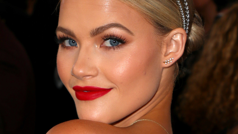 Witney Carson wears red lipstick