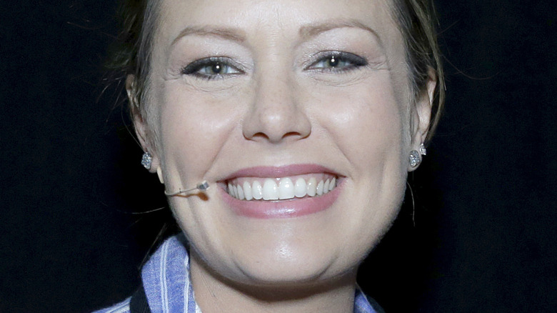 Dylan Dreyer smiling and wearing a headset