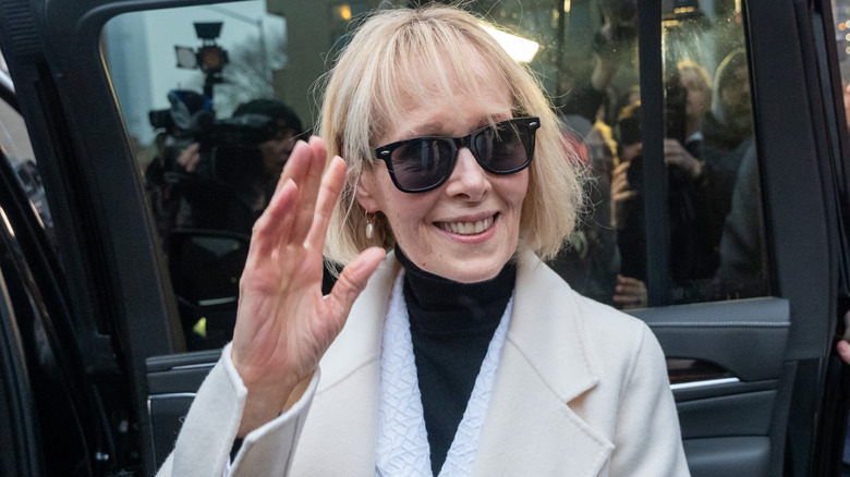 E. Jean Carroll waving