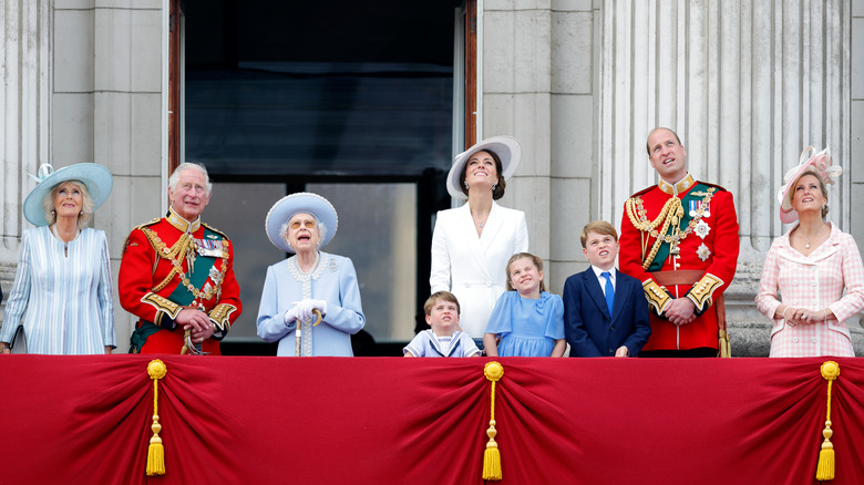 The royal family on balcony looking up