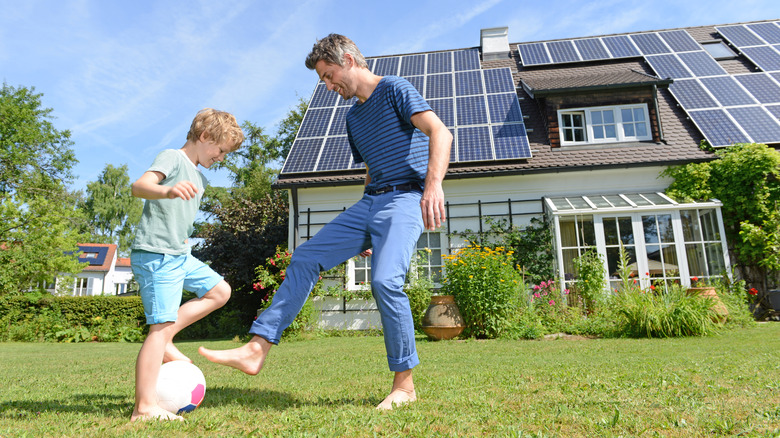 Man playing with his son