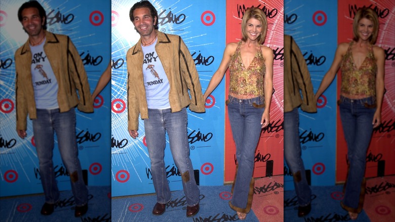 Mossimo Giannulli and Lori Loughlin holding hands
