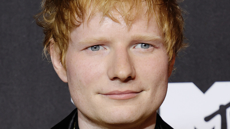 Ed Sheeran posing for a picture at the VMAs