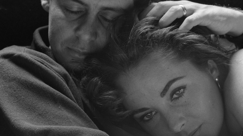 Close-up of married couple, American singer and actor Eddie Fisher (1928 - 2010) and British-American actress Elizabeth Taylor (1932 - 2011), June 1959.