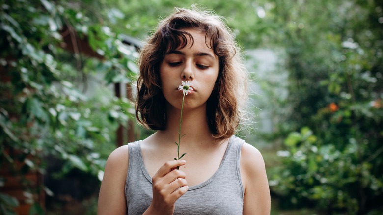 Woman smelling lavender