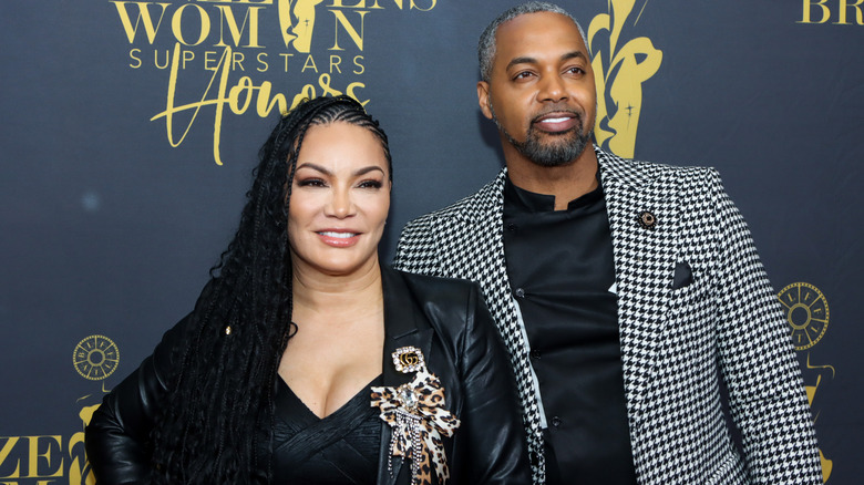 Egypt Sherrod and Mike Jackson smiling for photos