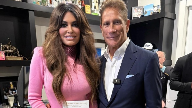 Kimberly Guilfoyle and Dr. Nicholas Perricone pose together during his book tour in 2025