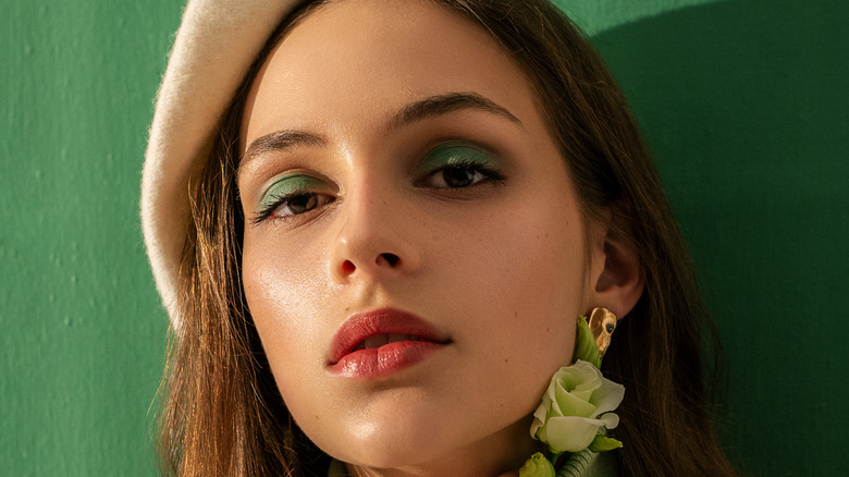 Woman wearing green eyeshadow 