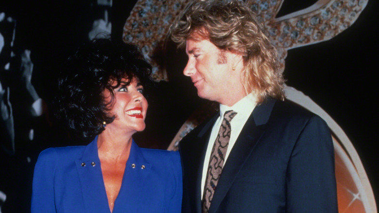Elizabeth Taylor looking at Larry Fortnesky
