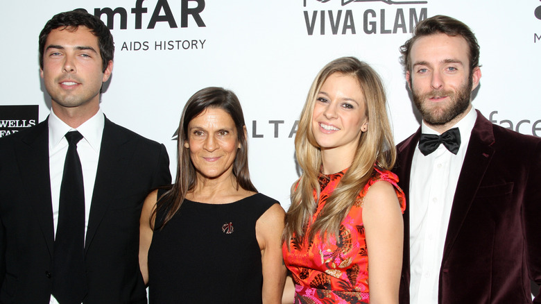 Caleb Wilding, Aileen Getty, Alexandra Wilding, and Andrew Wilding posing at an event