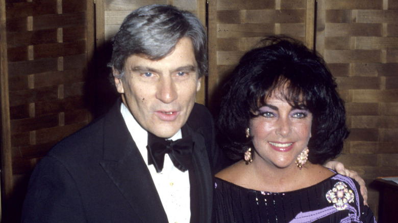 John Warner and Elizabeth Taylor smiling
