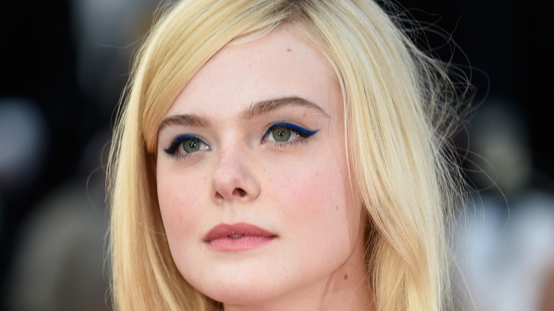 Elle Fanning poses on the red carpet