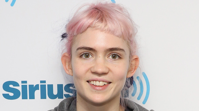 Grimes smiling