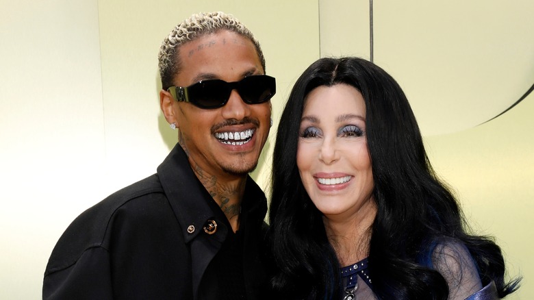 Cher smiling with Alexander Edwards