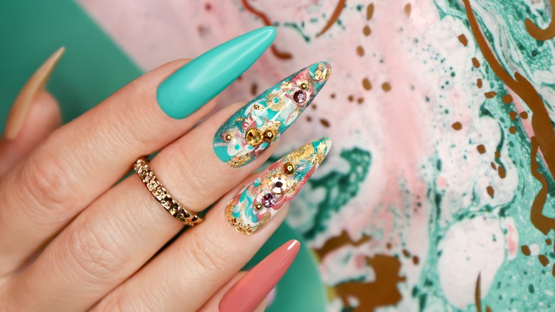 Turquoise and peach marble nails 