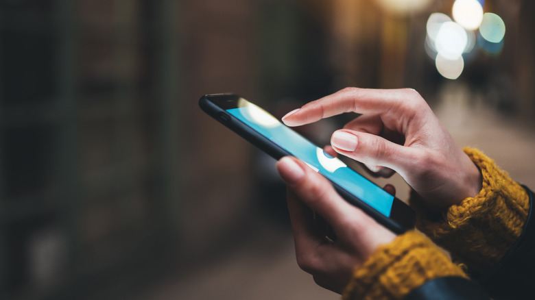 Woman using cell phone