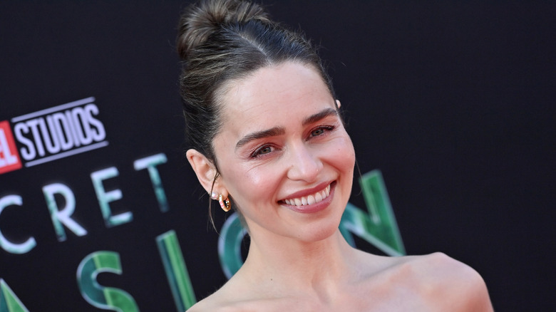 Emilia Clarke smiling on red carpet