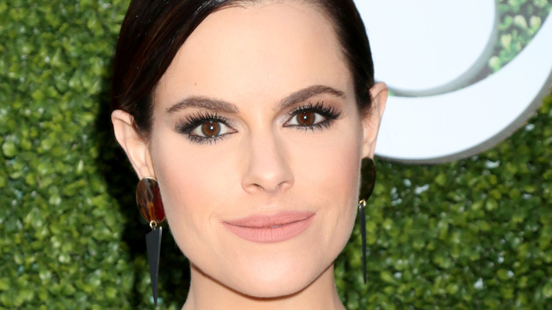 Emily Hampshire poses on the red carpet