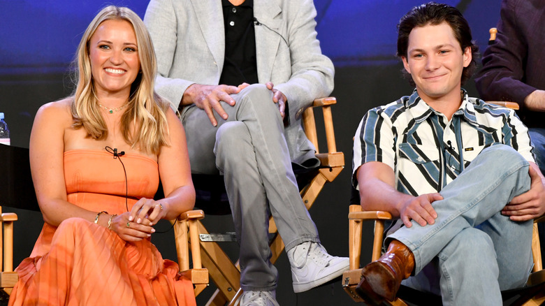 Emily Osment and Montana Jordan smiling at "Georgie & Mandy's First Marriage" Q&A segment in 2024