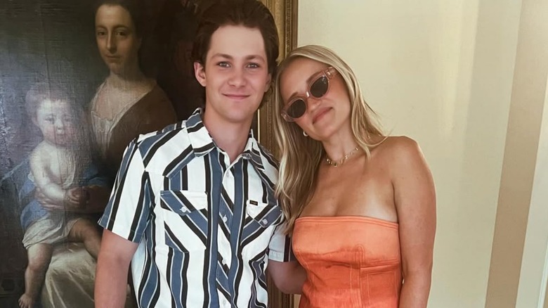 Emily Osment and Montana Jordan smiling