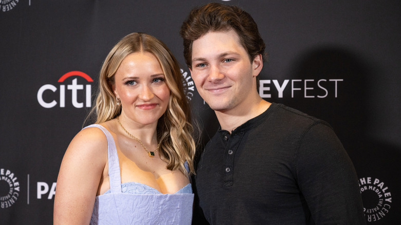 Emily Osment and Montana Jordan smiling at Dolby Theatre in 2024