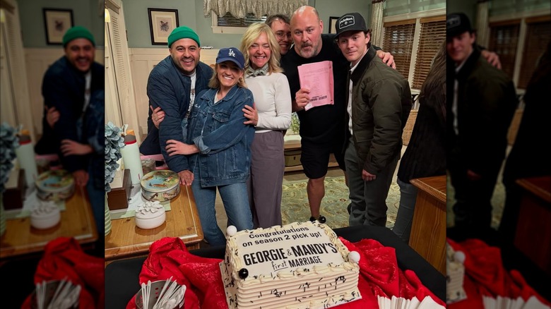 Dougie Baldwin, Emily Osment, Jessie Perez, Montana Jordan, Rachel Bay Jones, and Will Sasso looking at a cake on the set of "Georgie & Mandy's First Marriage"