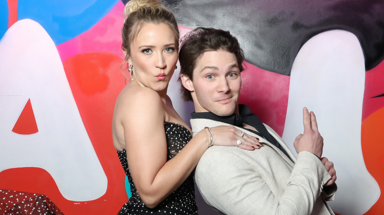 Emily Osment and Montana Jordan posing at the CMT Music Awards in 2024