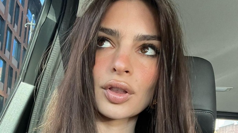 Emily Ratajkowski taking a selfie