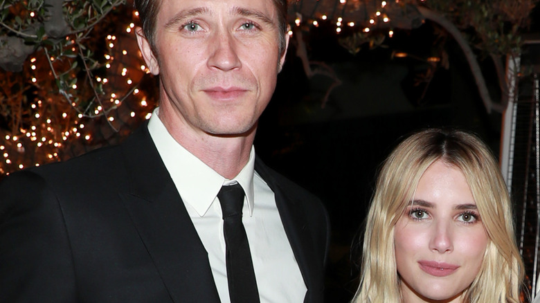 Emma Roberts and Garrett Hedlund at a party together
