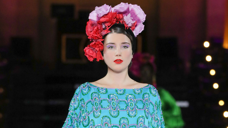 Gaia Wise walking the catwalk at London Fashion Week
