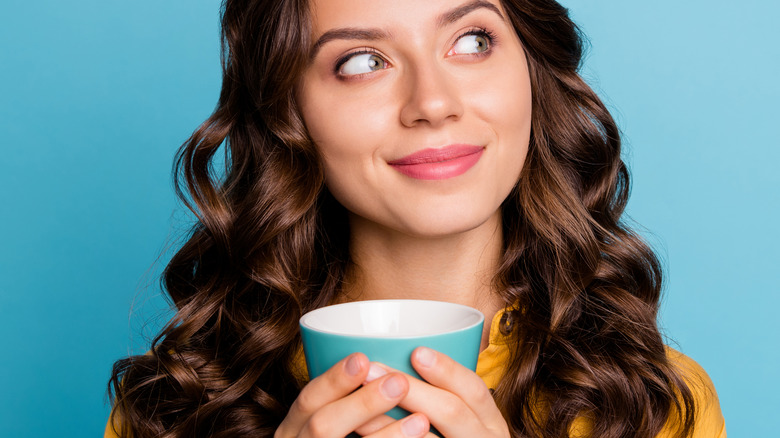 brunette with cup of tea