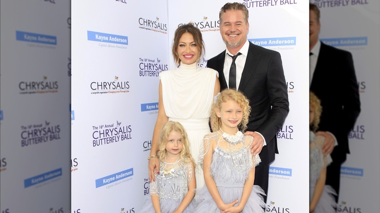 Rebecca Gayheart, Eric Dane, and their daughters at a red carpet event