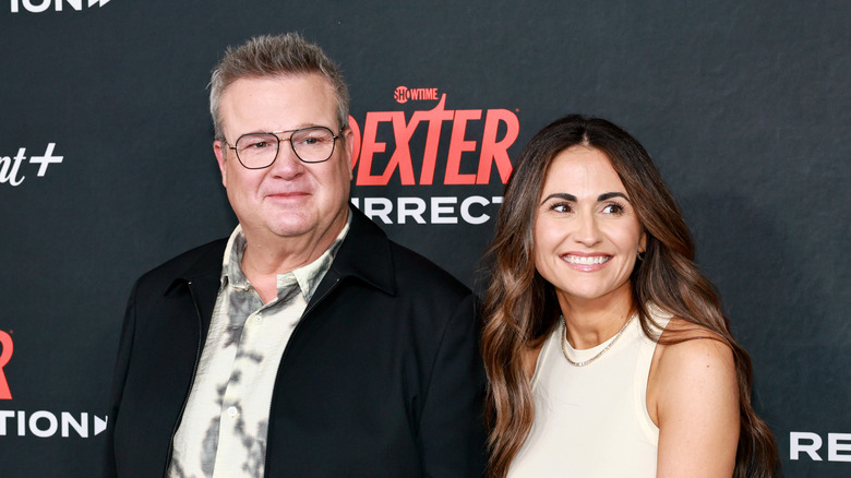 Eric Stonestreet and Lindsay Schweitzer pose together while attending the 