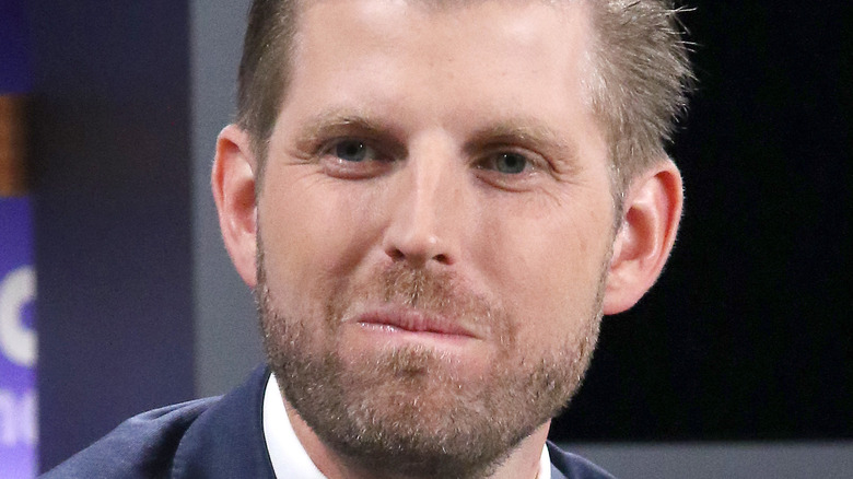 Eric Trump smirking during television appearance
