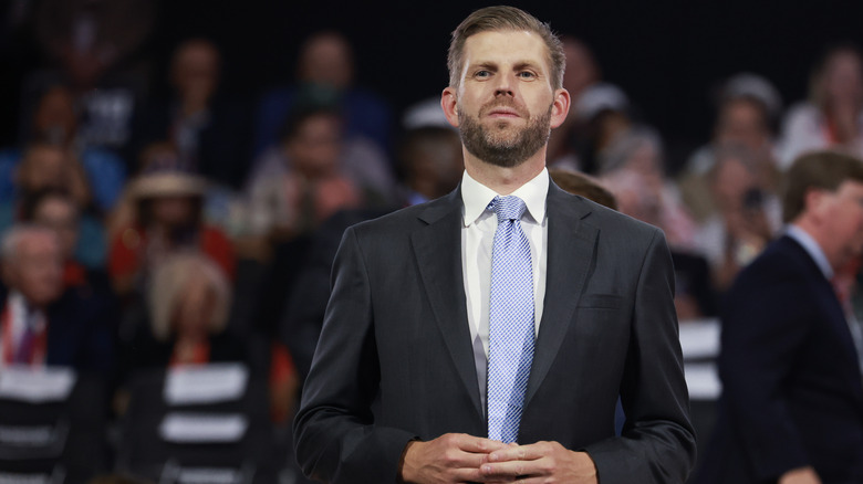 Eric Trump smiling, giving thumbs-up