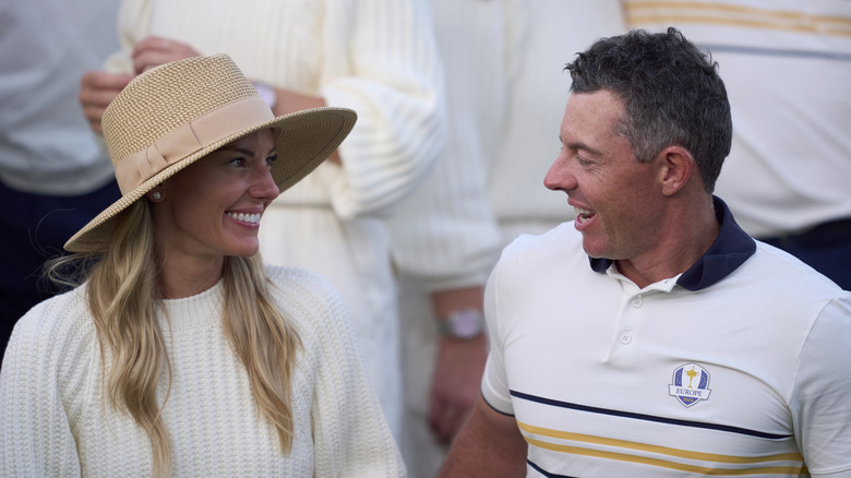 Erica Stoll and Rory McIlroy looking at each other
