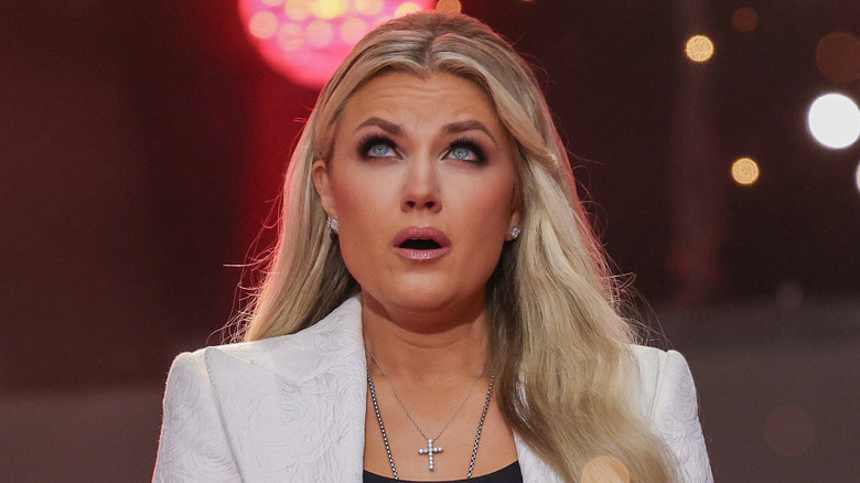 Erika Kirk wearing a white suit