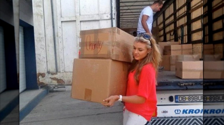 Erika Kirk unloading clothing donations in Romania