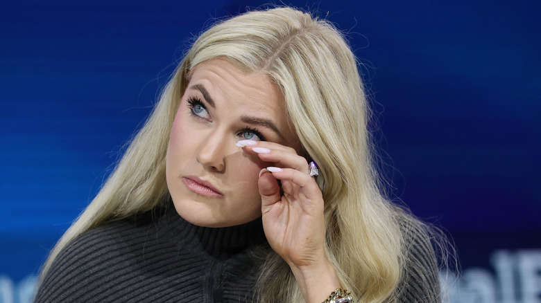 Erika Kirk wiping away a tear