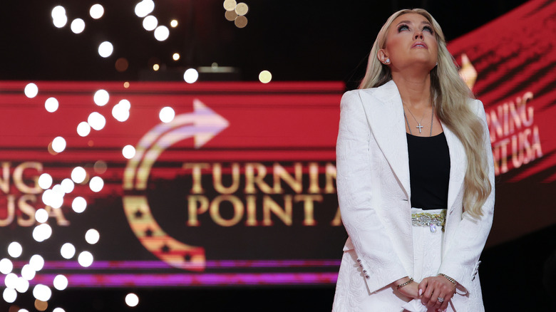 Erika Krik looking up at the sky during Charlie Kirk's memorial