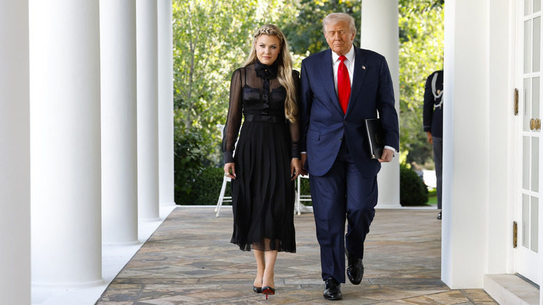 Erika Kirk and President Donald Trump walking outside at the White House in October 2025