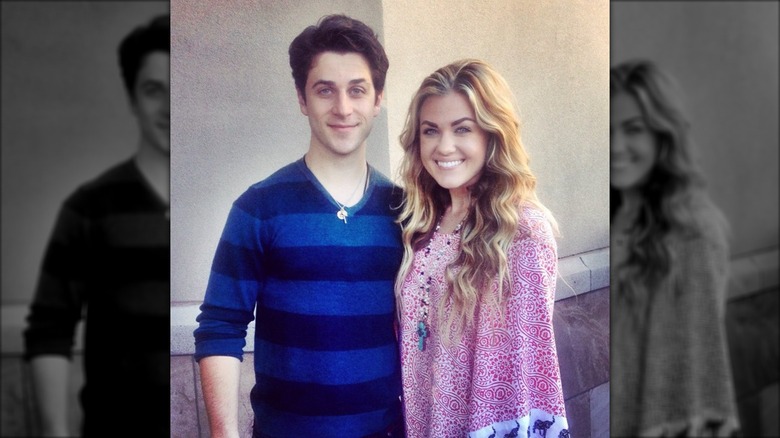 David Henrie and Erika Kirk smiling for a photo in 2014