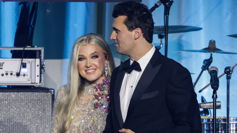 Erika Kirk standing next to Charlie Kirk onstage