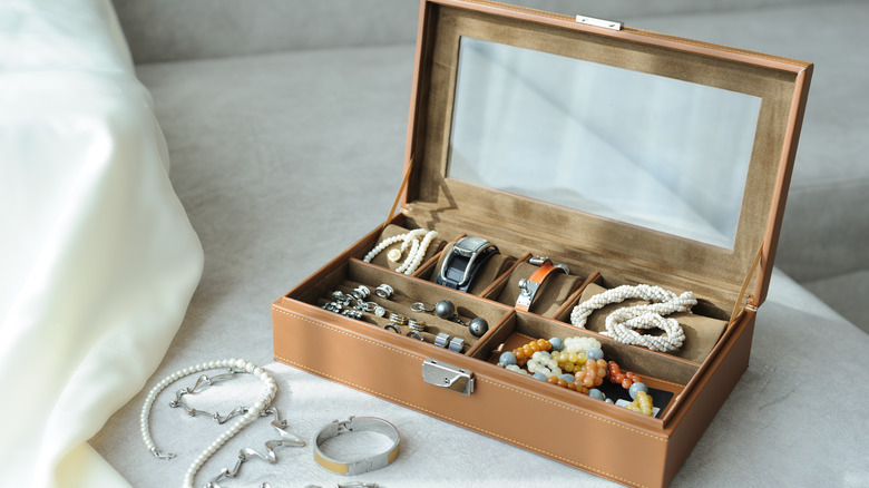 A jewelry box filled with accessories 