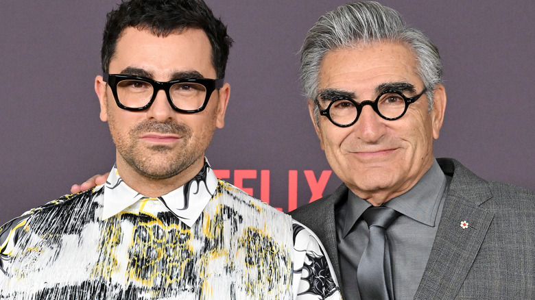 Dan and Eugene Levy smile together